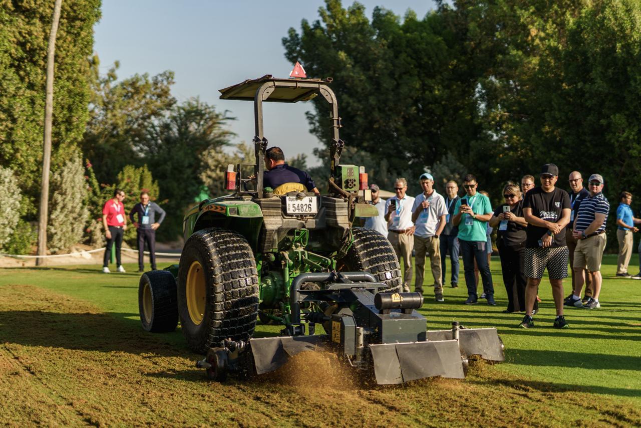 Live turf maintenance machinery demonstration