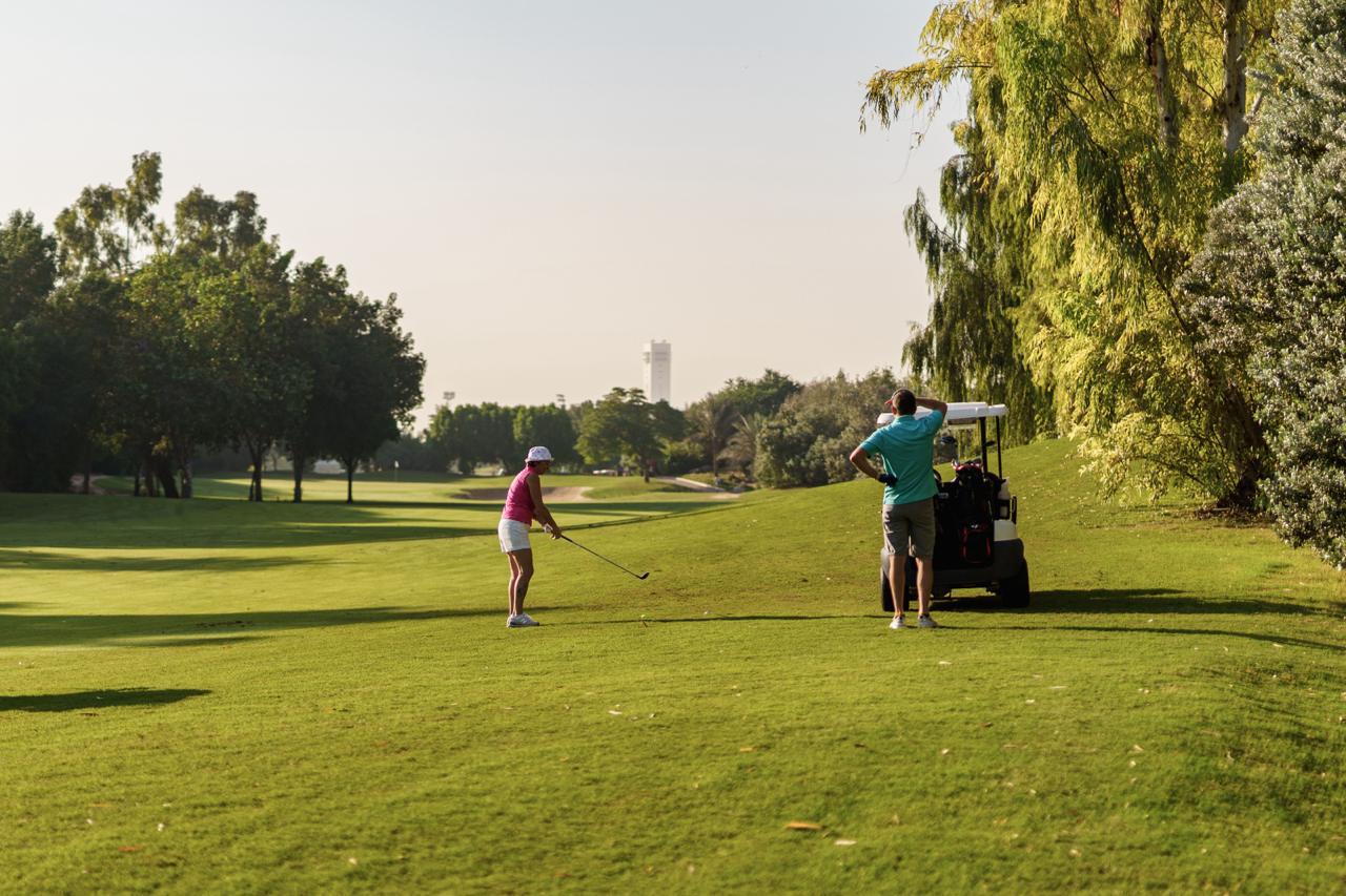 TurfEducation guests playing golf in Dubai